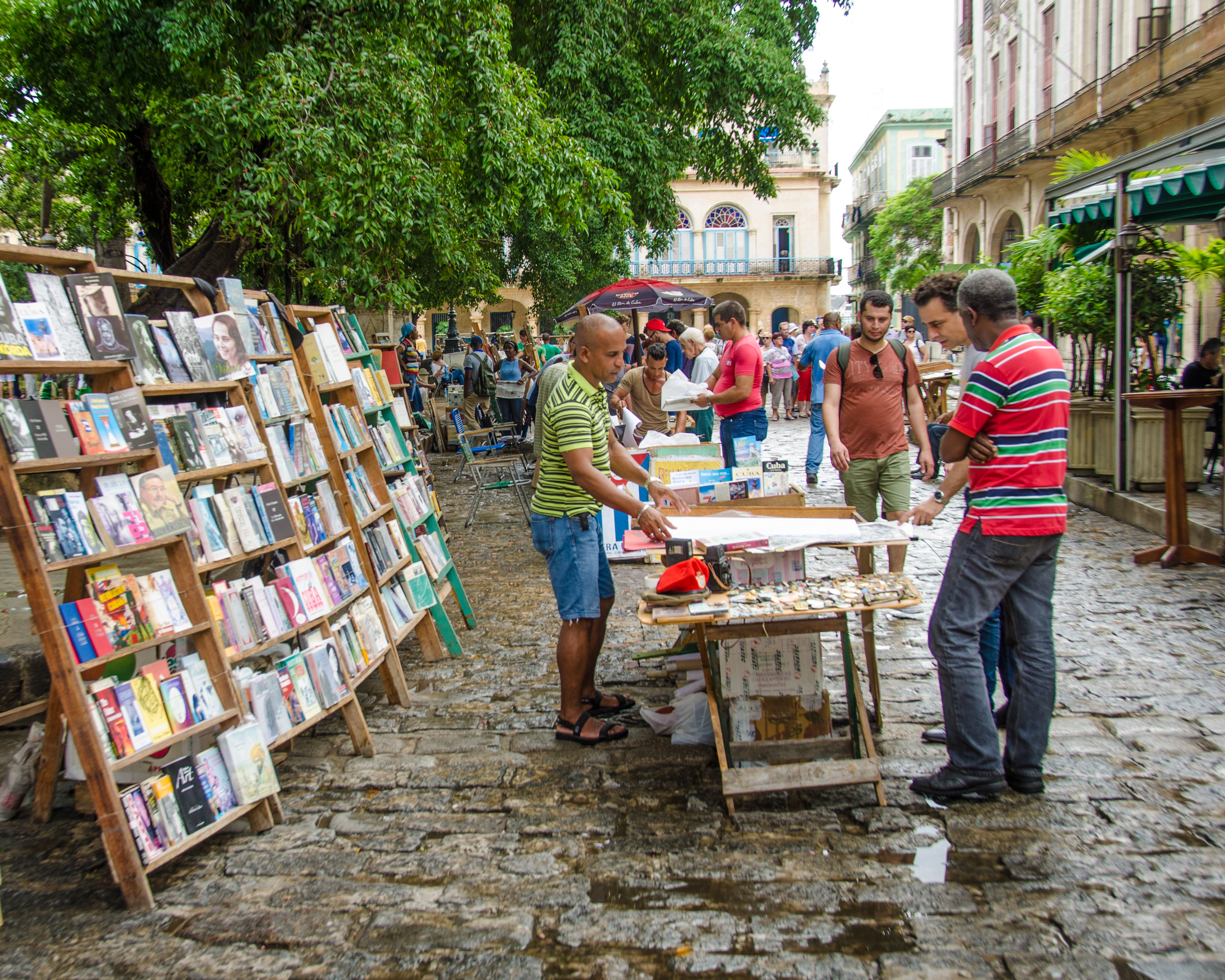 google maps street view tour Tourists examine a poster at one of the stalls at Plaza de Armas selling books