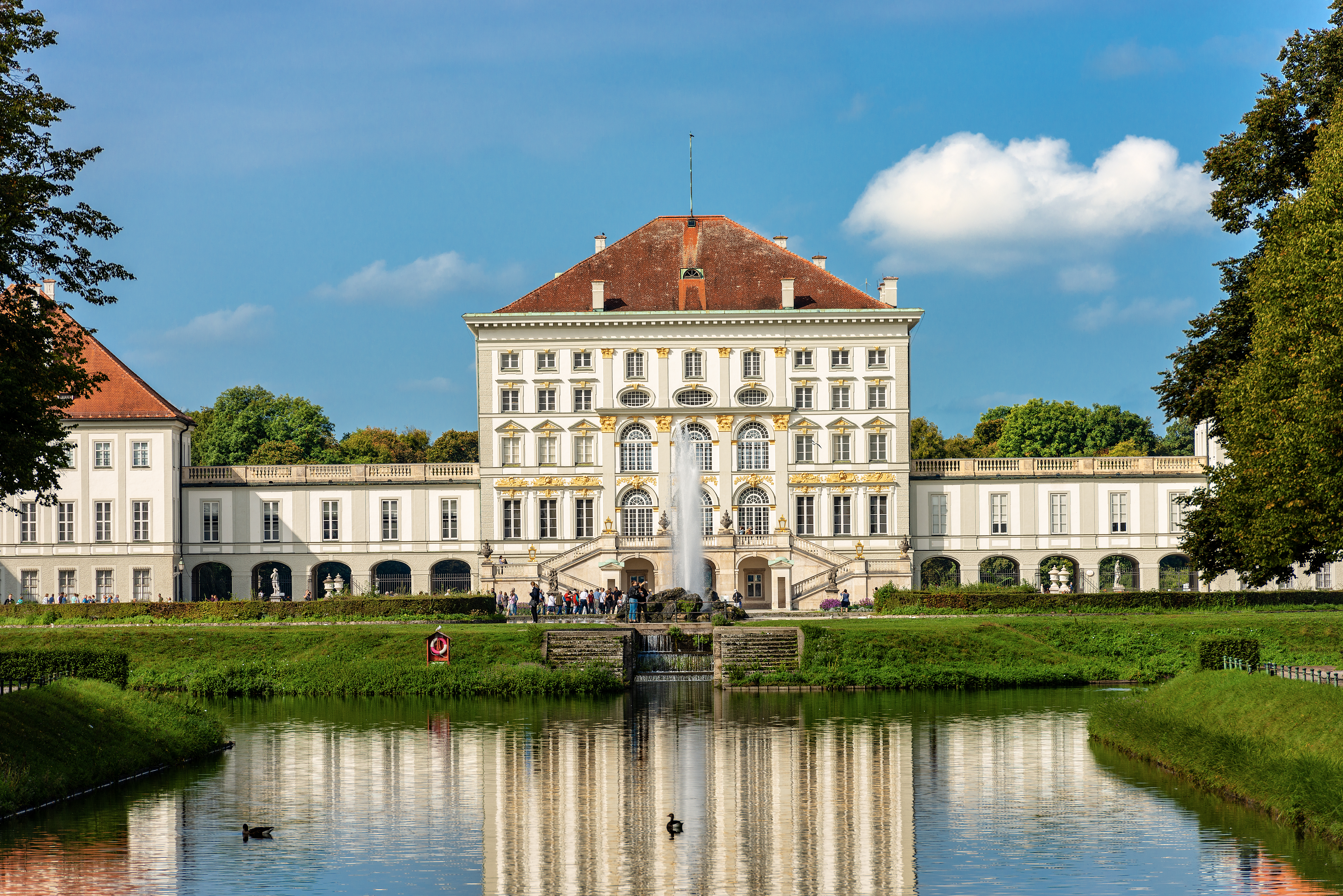 The grounds of Schloss Nymphenburg reflected in the river