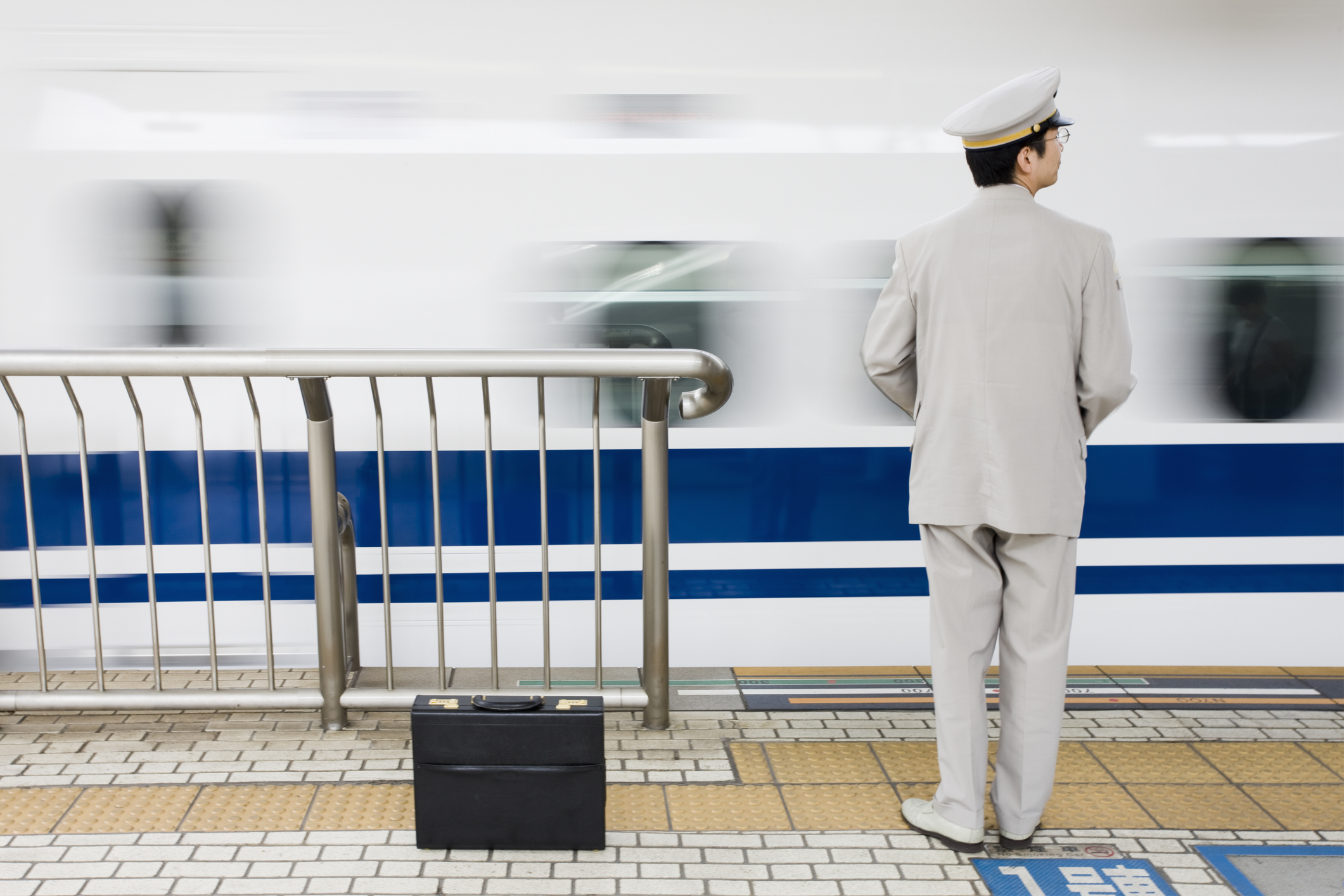 Nozomi style bullet train in Kyoto railway station, Kyoto, Japan Nozomi style bullet train in Kyoto railway station, Kyoto, Japan