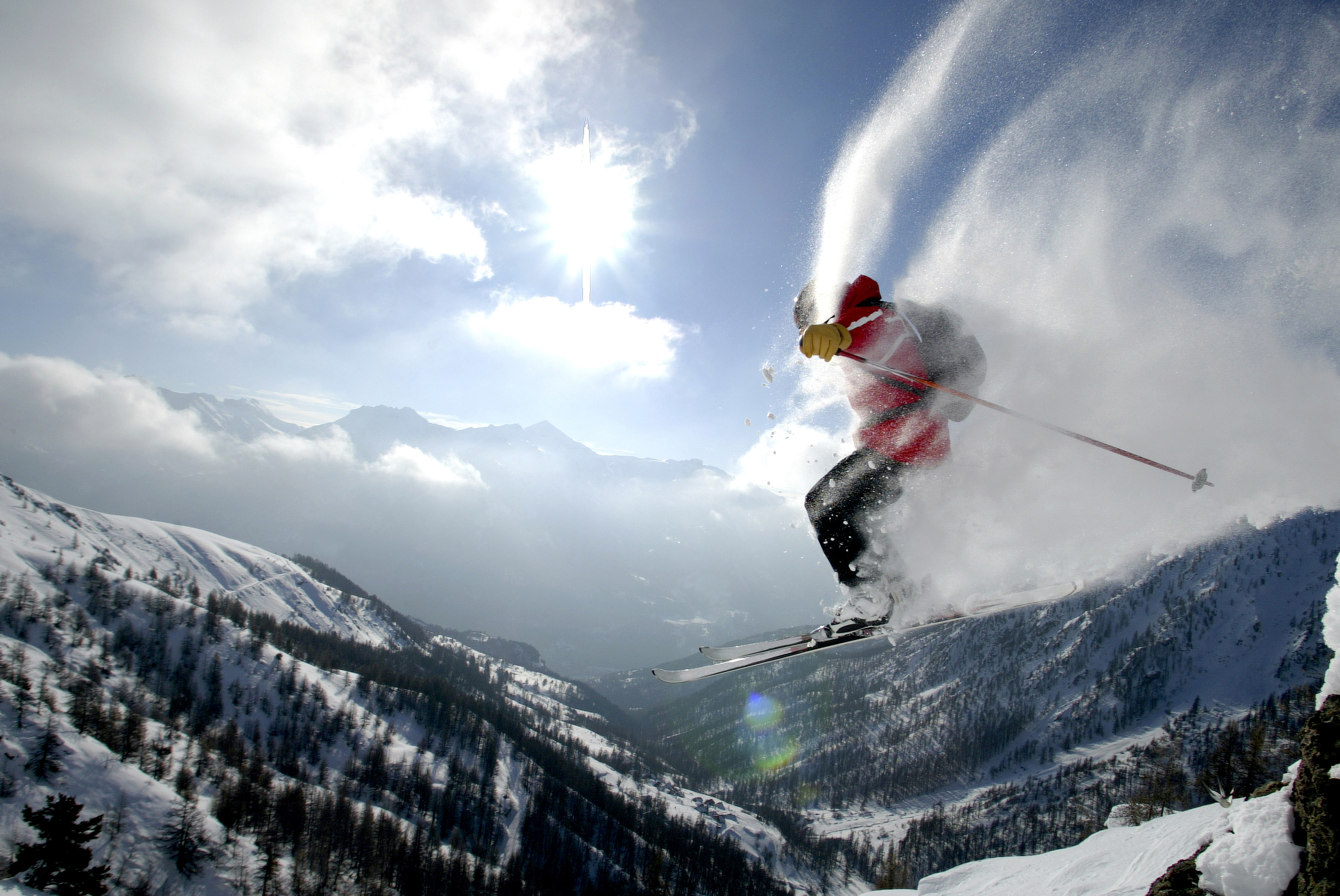 A skier in mid air in Serre Chevalier, France Getty Images