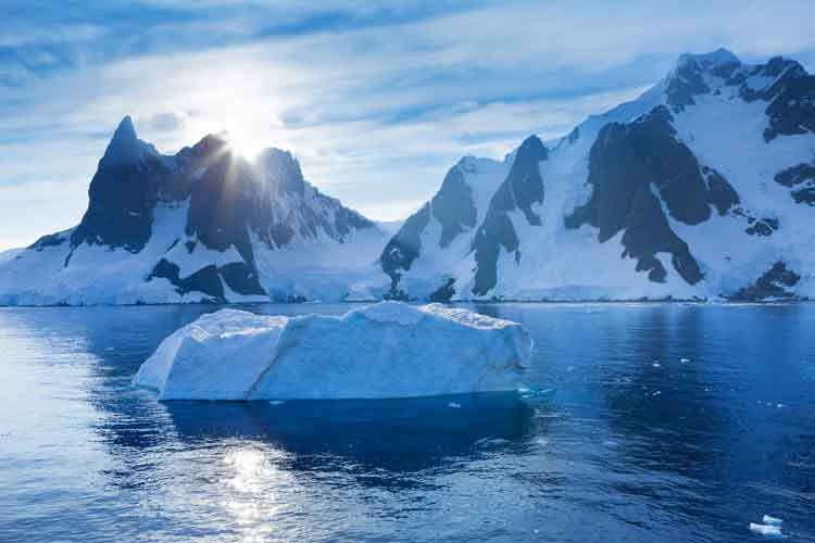 Antarctica's Lemaire channel at first light. Image by Ralf Hettler / E+ / Getty Images.