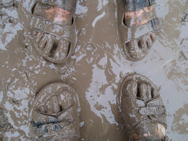 Mud, glorious mud, an essential feature of Glastonbury Festival. Image by Peter Burgess / CC BY 2.0